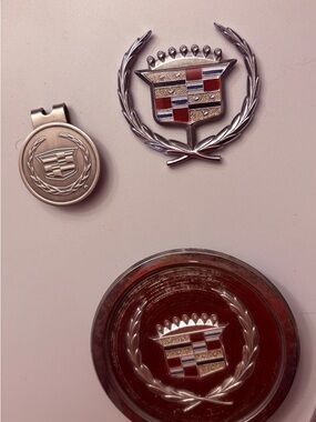 Cadillac lot vintage- Emblem Key Clip hood ornament,  & hub cap